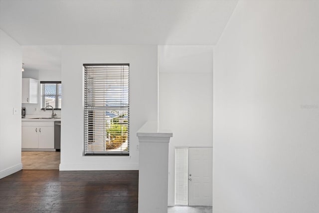 970 Sandpiper Cir Unit 970, Bradenton, FL 34209 - unfurnished living room featuring wood finished floors and baseboards