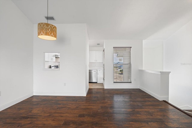 970 Sandpiper Cir Unit 970, Bradenton, FL 34209 - unfurnished living room with wood finished floors and baseboards