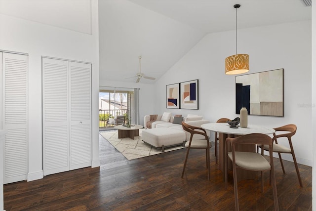 970 Sandpiper Cir Unit 970, Bradenton, FL 34209 - dining room with wood finished floors, high vaulted ceiling, and a ceiling fan