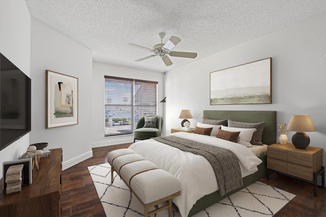 970 Sandpiper Cir Unit 970, Bradenton, FL 34209 - bedroom featuring a textured ceiling, wood finished floors, and a ceiling fan