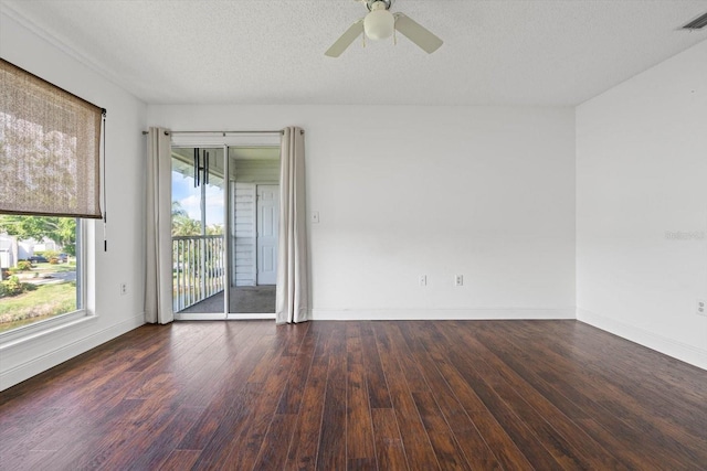 970 Sandpiper Cir Unit 970, Bradenton, FL 34209 - empty room with wood finished floors, ceiling fan, and a textured ceiling