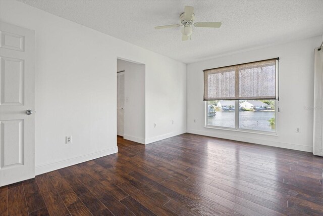 970 Sandpiper Cir Unit 970, Bradenton, FL 34209 - spare room with ceiling fan, a textured ceiling, and wood finished floors