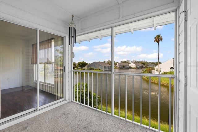 970 Sandpiper Cir Unit 970, Bradenton, FL 34209 - unfurnished sunroom with a water view and a residential view
