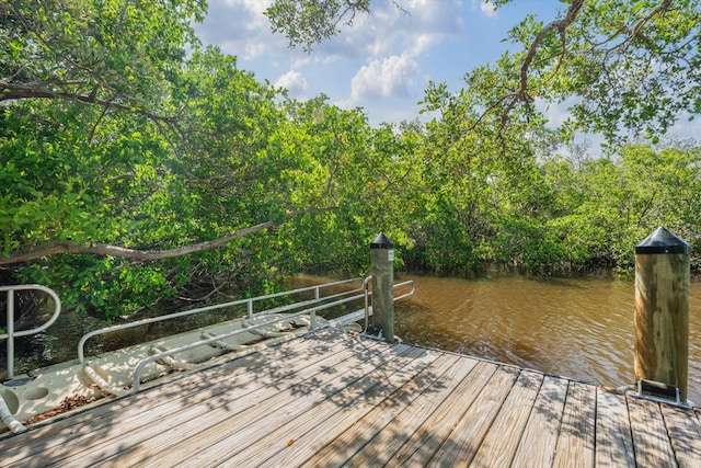 970 Sandpiper Cir Unit 970, Bradenton, FL 34209 - dock area featuring a water view