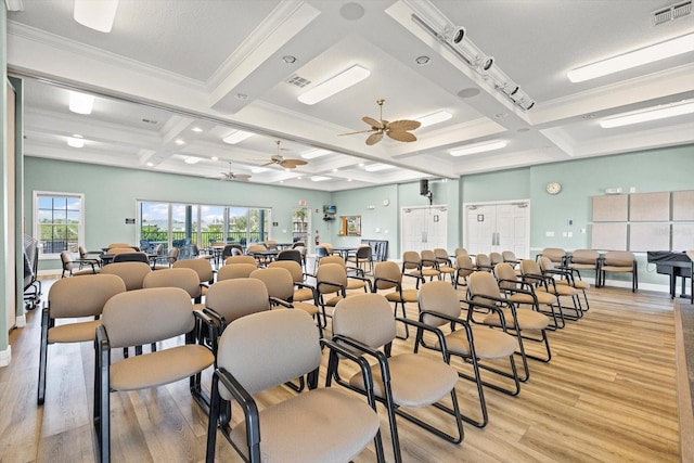 970 Sandpiper Cir Unit 970, Bradenton, FL 34209 - misc room featuring coffered ceiling, light wood finished floors, a ceiling fan, beamed ceiling, and ornamental molding