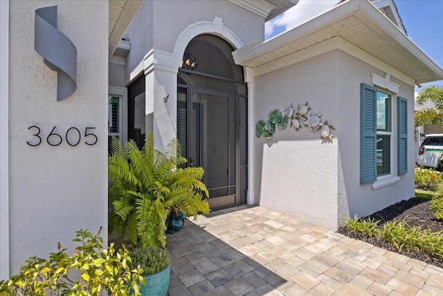 3605 Wild Blossom Pl, Parrish, FL 34219 - doorway to property with stucco siding