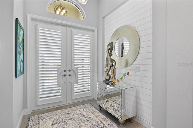 3605 Wild Blossom Pl, Parrish, FL 34219 - foyer entrance featuring french doors and wood finished floors