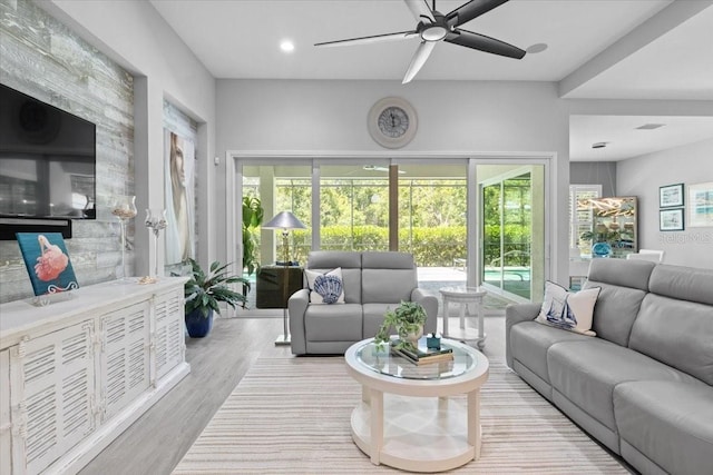3605 Wild Blossom Pl, Parrish, FL 34219 - living room featuring ceiling fan, wood finished floors, plenty of natural light, and recessed lighting
