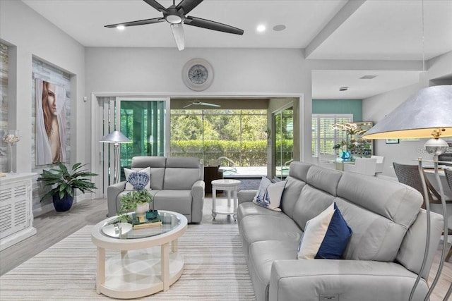 3605 Wild Blossom Pl, Parrish, FL 34219 - living area with a ceiling fan and wood finished floors