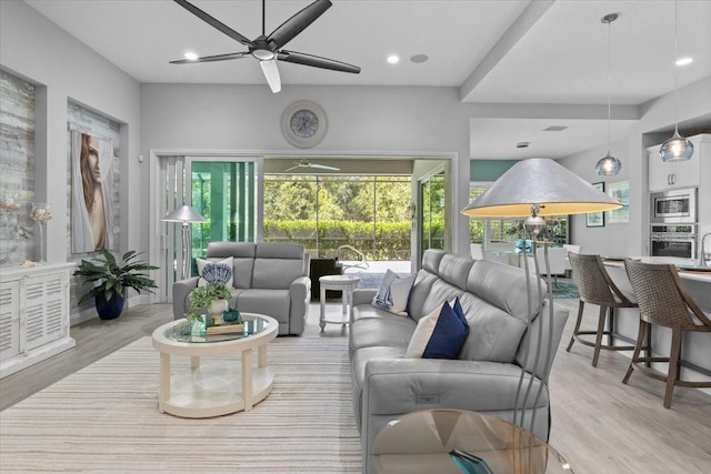 3605 Wild Blossom Pl, Parrish, FL 34219 - living area with ceiling fan, wood finished floors, and recessed lighting