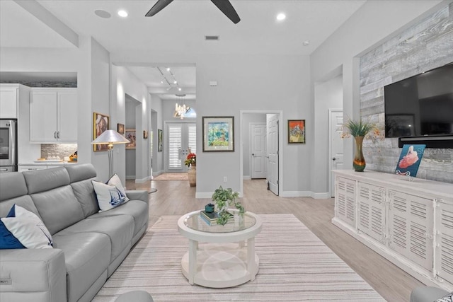 3605 Wild Blossom Pl, Parrish, FL 34219 - living area with a ceiling fan, recessed lighting, light wood finished floors, and a chandelier
