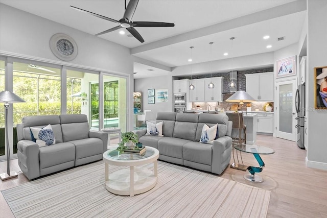 3605 Wild Blossom Pl, Parrish, FL 34219 - living room featuring a ceiling fan, light wood-type flooring, and recessed lighting