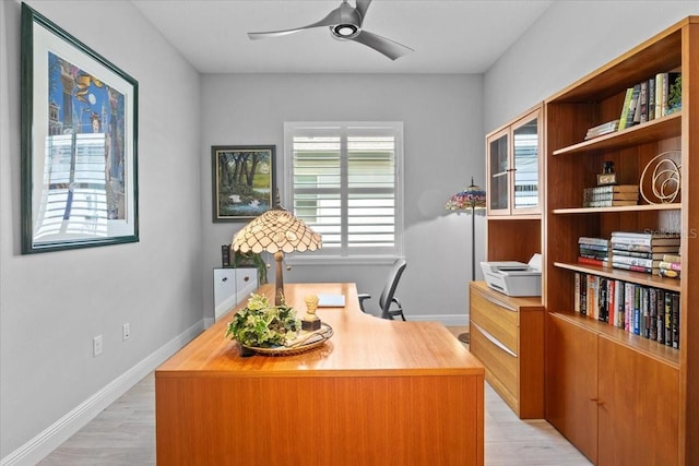 3605 Wild Blossom Pl, Parrish, FL 34219 - home office with a ceiling fan and light wood-type flooring