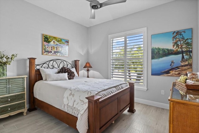 3605 Wild Blossom Pl, Parrish, FL 34219 - bedroom featuring light wood finished floors and ceiling fan