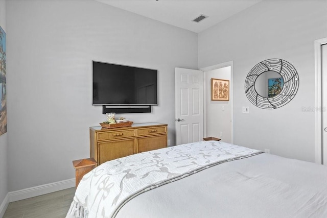 3605 Wild Blossom Pl, Parrish, FL 34219 - bedroom featuring baseboards and light wood-type flooring