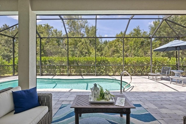 3605 Wild Blossom Pl, Parrish, FL 34219 - outdoor pool with a patio area and glass enclosure