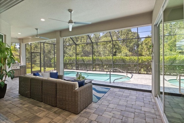 3605 Wild Blossom Pl, Parrish, FL 34219 - sunroom with a pool, a ceiling fan, an outdoor living space, and a jacuzzi