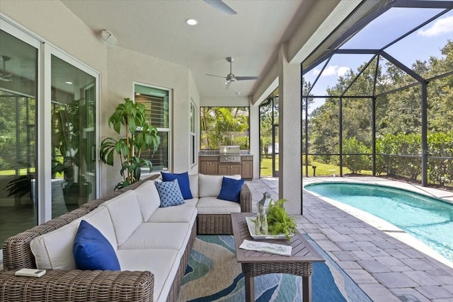 3605 Wild Blossom Pl, Parrish, FL 34219 - sunroom featuring ceiling fan, area for grilling, and an outdoor living space