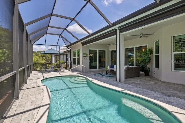 3605 Wild Blossom Pl, Parrish, FL 34219 - outdoor pool featuring ceiling fan, a patio, a lanai, and outdoor lounge area