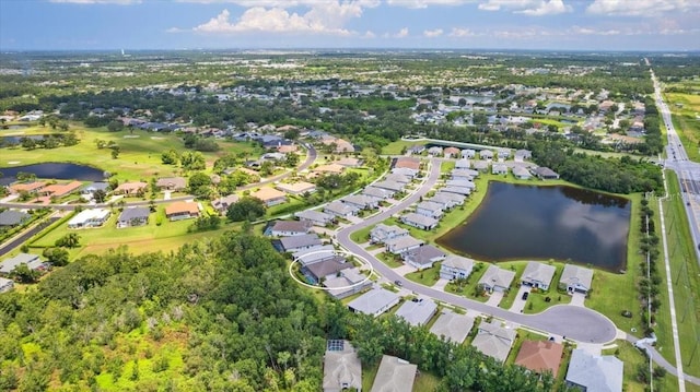3605 Wild Blossom Pl, Parrish, FL 34219 - aerial view of property and surrounding area featuring a nearby body of water and nearby suburban area