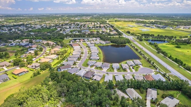 3605 Wild Blossom Pl, Parrish, FL 34219 - aerial view of property's location with nearby suburban area and a large body of water