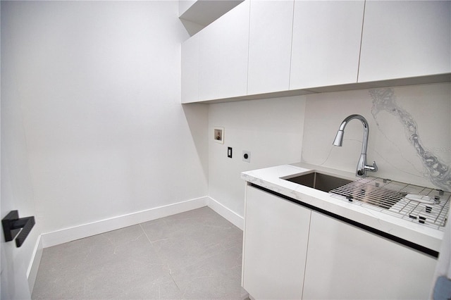 266 W Pine Valley Ln, Rotonda West, FL 33947 - washroom featuring cabinet space, electric dryer hookup, and washer hookup