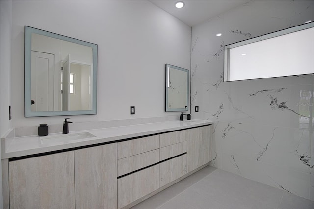 266 W Pine Valley Ln, Rotonda West, FL 33947 - bathroom with double vanity and recessed lighting