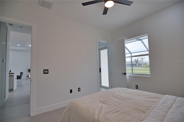 266 W Pine Valley Ln, Rotonda West, FL 33947 - bedroom with ceiling fan and light tile patterned floors