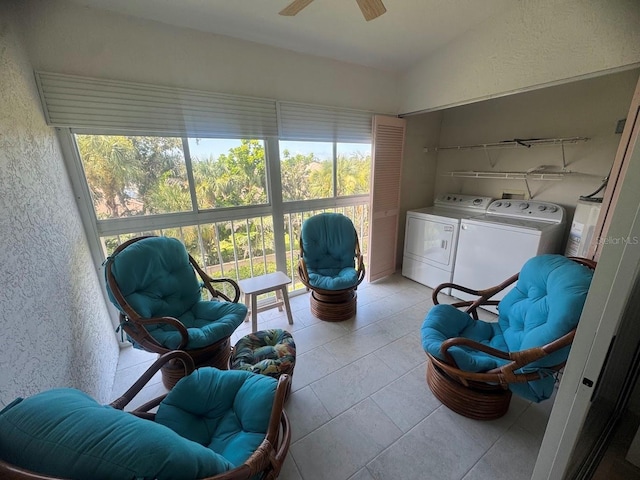 7301 29th Avenue Dr W Unit 310, Bradenton, FL 34209 - living area featuring washer and clothes dryer, ceiling fan, vaulted ceiling, and light tile patterned flooring