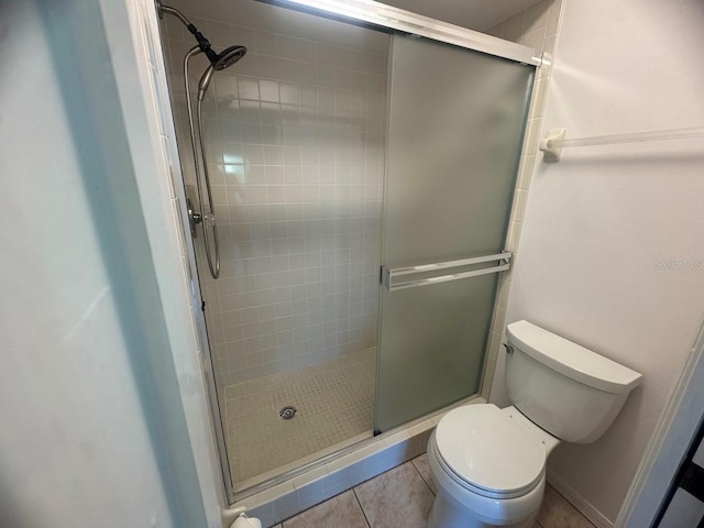 7301 29th Avenue Dr W Unit 310, Bradenton, FL 34209 - bathroom featuring a stall shower and tile patterned floors