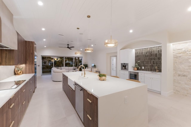 615 Concord Ln, Holmes Beach, FL 34217 - kitchen with modern cabinets, black electric stovetop, dishwasher, beverage cooler, and recessed lighting
