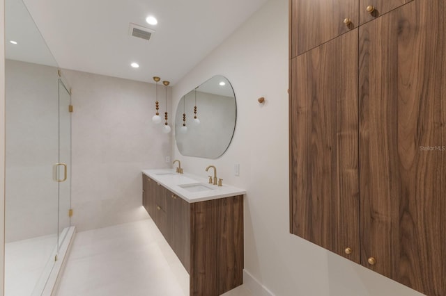 615 Concord Ln, Holmes Beach, FL 34217 - full bath featuring double vanity, a shower stall, and recessed lighting