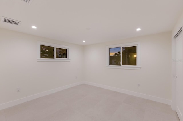 615 Concord Ln, Holmes Beach, FL 34217 - empty room with recessed lighting