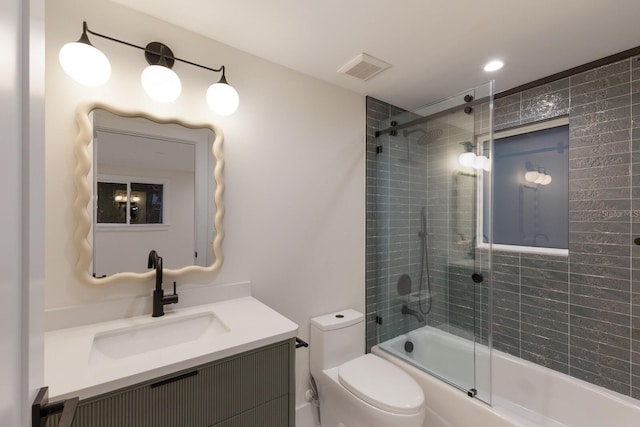 615 Concord Ln, Holmes Beach, FL 34217 - full bathroom with vanity and bath / shower combo with glass door