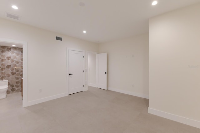 615 Concord Ln, Holmes Beach, FL 34217 - spare room with recessed lighting