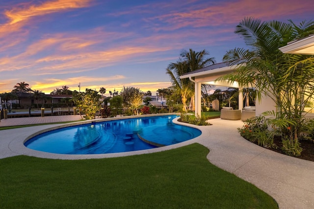 615 Concord Ln, Holmes Beach, FL 34217 - outdoor pool featuring a lawn, a gazebo, and a patio area