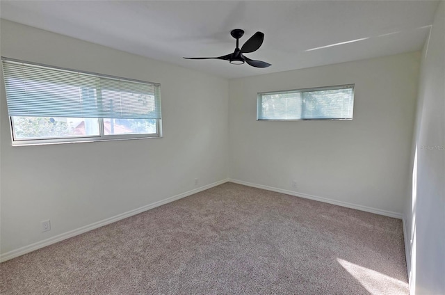 4074 Redbird Cir, Sarasota, FL 34231 - spare room with healthy amount of natural light, carpet floors, and ceiling fan