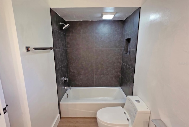 4074 Redbird Cir, Sarasota, FL 34231 - bathroom featuring wood finished floors and shower / tub combination