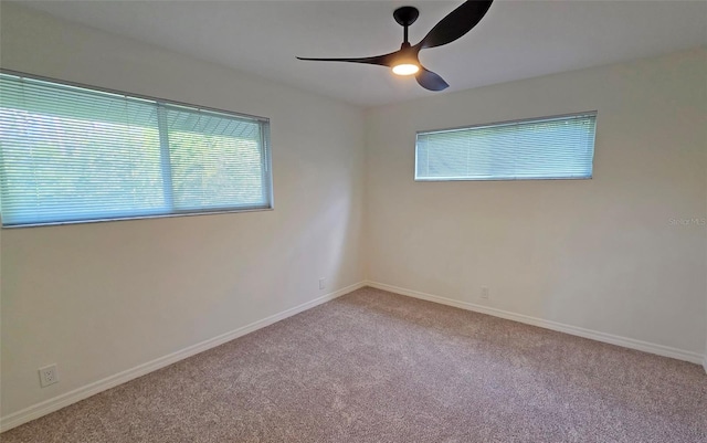 4074 Redbird Cir, Sarasota, FL 34231 - empty room with carpet floors and a ceiling fan