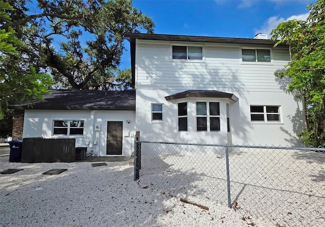 4074 Redbird Cir, Sarasota, FL 34231 - back of property with stucco siding