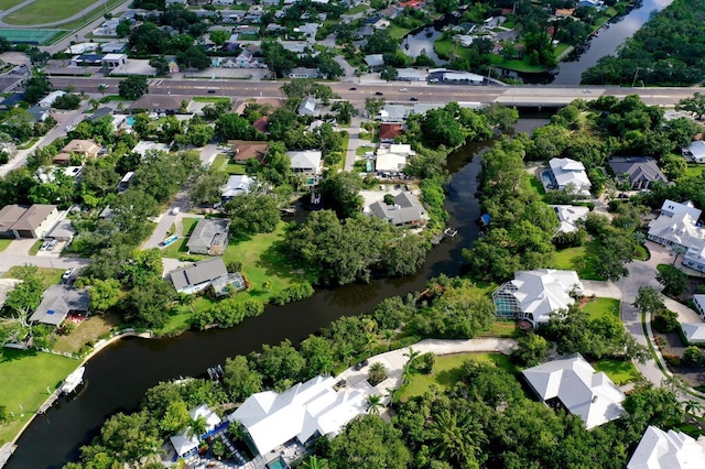 4074 Redbird Cir, Sarasota, FL 34231 - aerial view of property and surrounding area featuring nearby suburban area and a large body of water