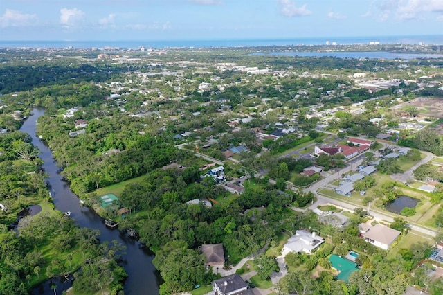 4074 Redbird Cir, Sarasota, FL 34231 - aerial view of property and surrounding area with a large body of water and nearby suburban area