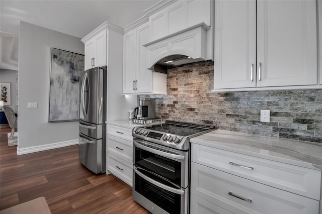 462 E Macewen Dr, Osprey, FL 34229 - kitchen featuring appliances with stainless steel finishes, dark wood-style flooring, light stone countertops, and white cabinetry
