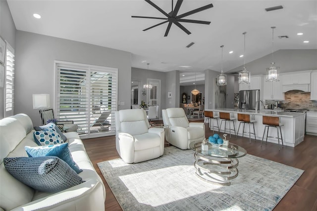 462 E Macewen Dr, Osprey, FL 34229 - living room featuring ceiling fan, dark wood-style flooring, recessed lighting, and vaulted ceiling