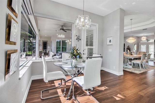 462 E Macewen Dr, Osprey, FL 34229 - dining room featuring a chandelier, wood finished floors, and ceiling fan