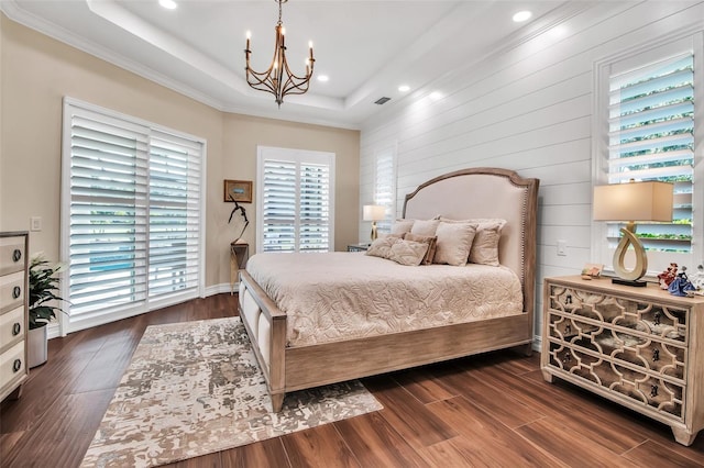 462 E Macewen Dr, Osprey, FL 34229 - bedroom with multiple windows, a raised ceiling, a chandelier, dark wood finished floors, and recessed lighting