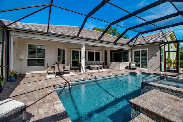462 E Macewen Dr, Osprey, FL 34229 - rear view of property featuring an outdoor living space, a patio, stucco siding, and a ceiling fan