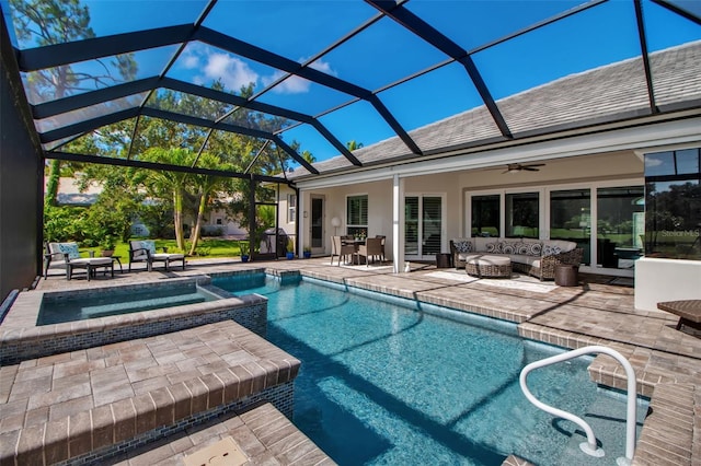462 E Macewen Dr, Osprey, FL 34229 - view of swimming pool with a patio, a pool with connected hot tub, a ceiling fan, outdoor lounge area, and glass enclosure