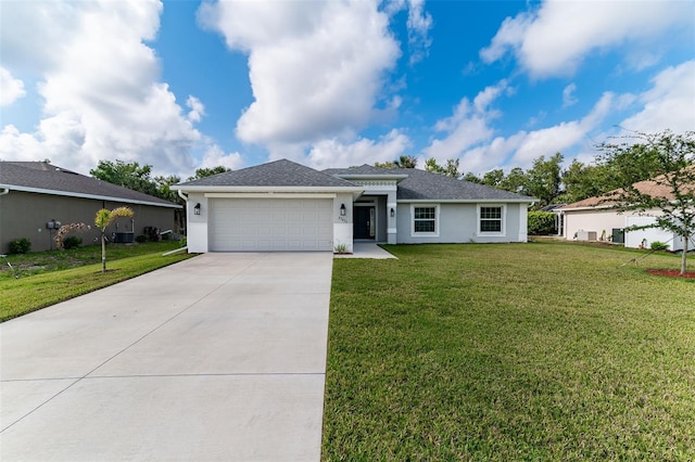 27471 Deep Creek Blvd, Punta Gorda, FL 33983 - single story home featuring driveway, a garage, a front lawn, and stucco siding