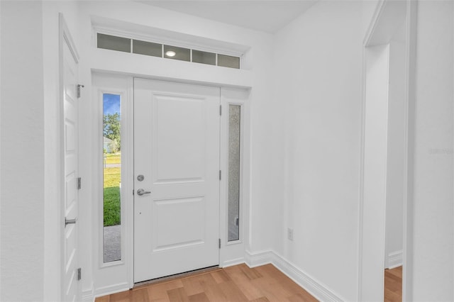 27471 Deep Creek Blvd, Punta Gorda, FL 33983 - entrance foyer featuring light wood-style floors and baseboards